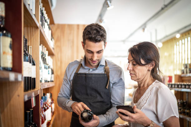 Employee and customer at wine store