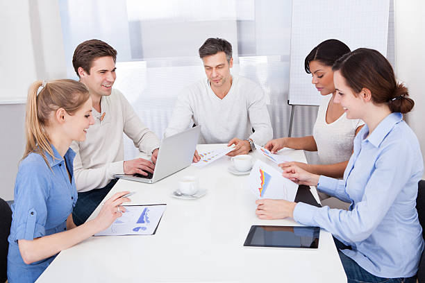 Happy Group Of Businesspeople In The Meeting agence web La Mulatière