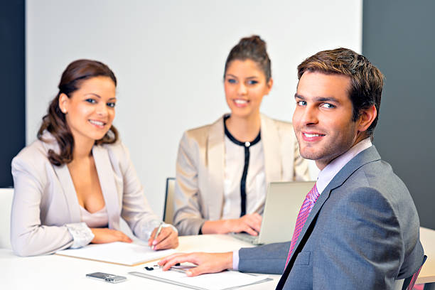 Young businessteam are working in a modern office. agence web Sainte-Foy-lès-Lyon