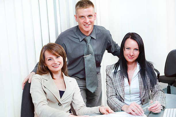 Three young managers in the office agence web Villeurbanne