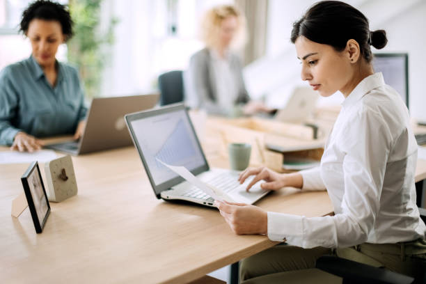 Young beautiful businesswoman working in the office agence web Jardin des Plantes