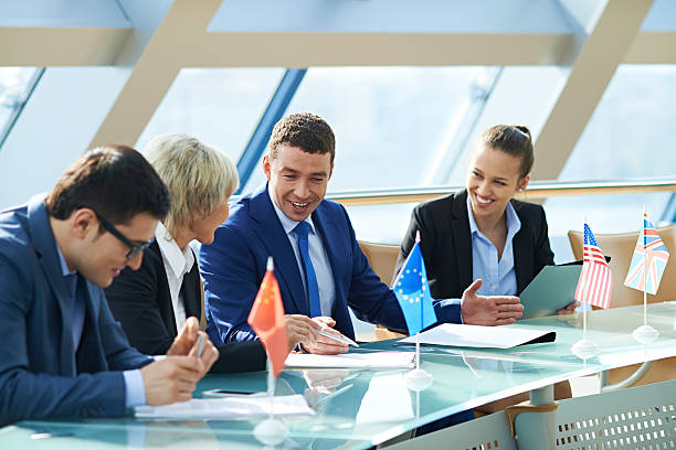 Business people talking at international business meeting agence web Île de la Cité